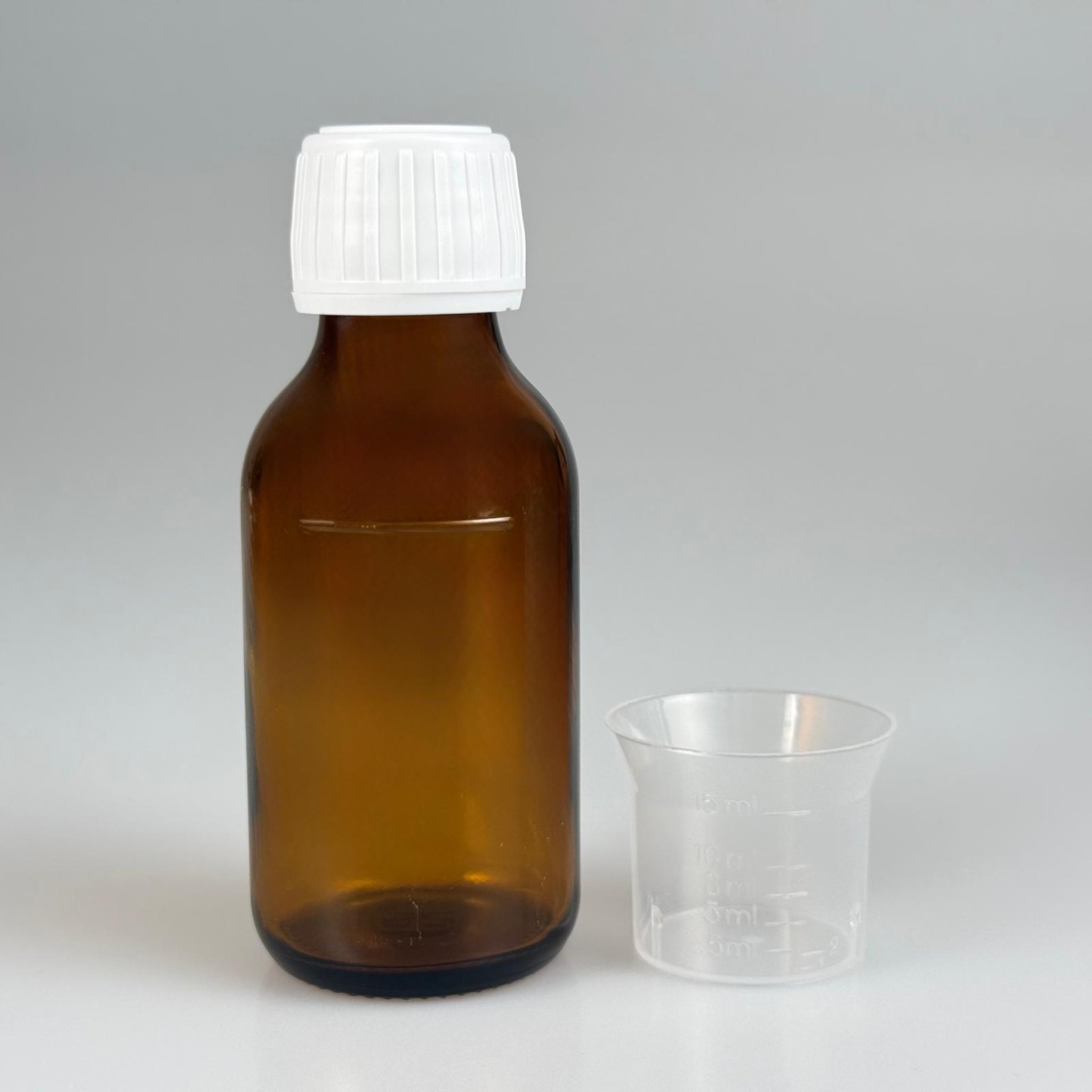 75 CC AMBER ECZA ŞİŞESİ + BEYAZ KİLİTLİ KAPAKLI + 15 ML ÖLÇEKLİ TAKIM - 75 AĞIZ KAHVERENGİ ŞURUP ŞİŞESİ