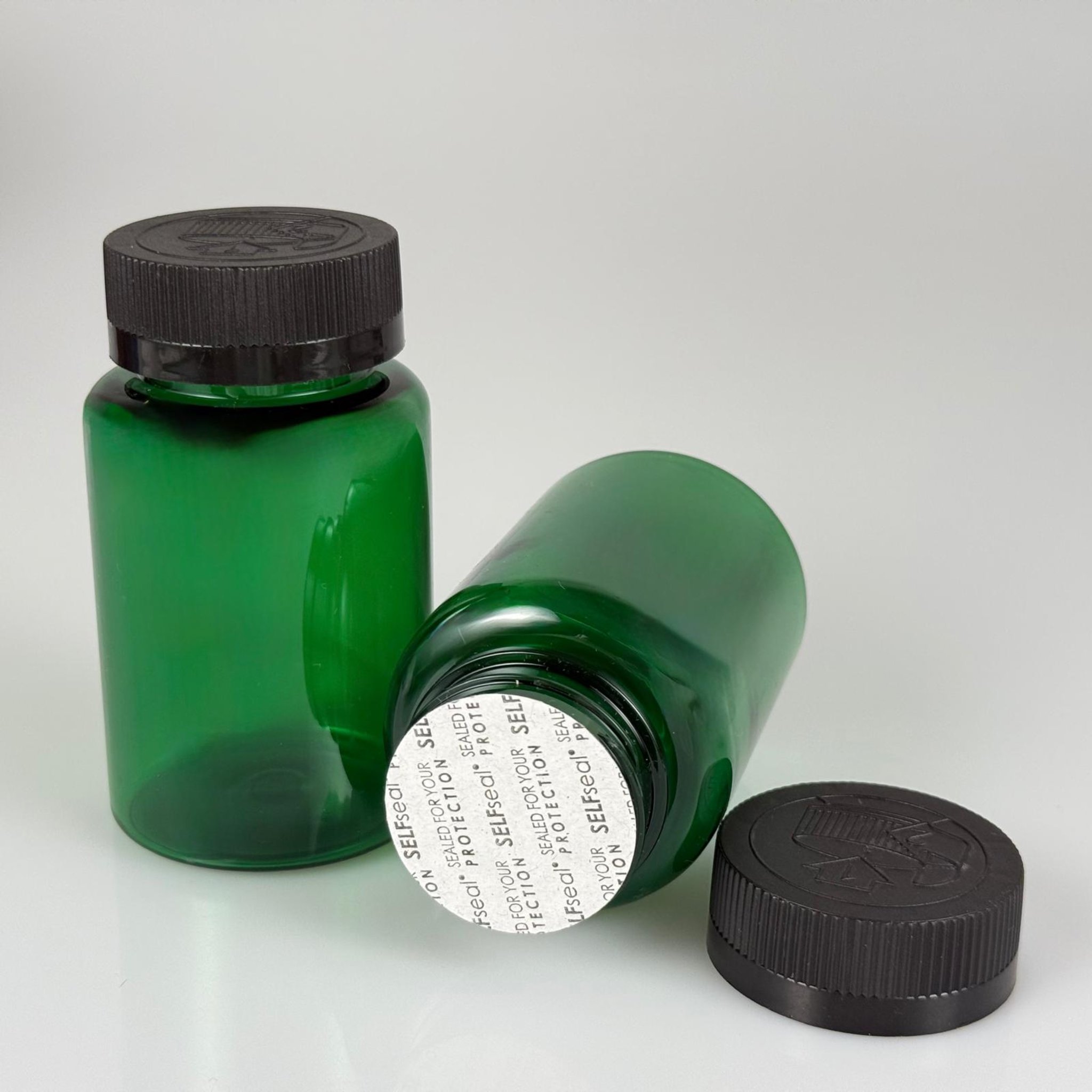 150 ML CONTALI ÇOCUK KİLİT KAPAKLI TABLET ŞİŞESİ  - 150 CC YEŞİL PET KAVANOZ + 38 MM SİYAH ÇOCUK KİLİTLİ KAPAK + KENDİNDEN YAPIŞKANLI KÖPÜK CONTA TAKIM -  KAPSÜL KUTUSU - İLAÇ ŞİŞESİ - MEDİKAL HAP ŞİŞESİ - FARMASÖTİK KAVANOZ