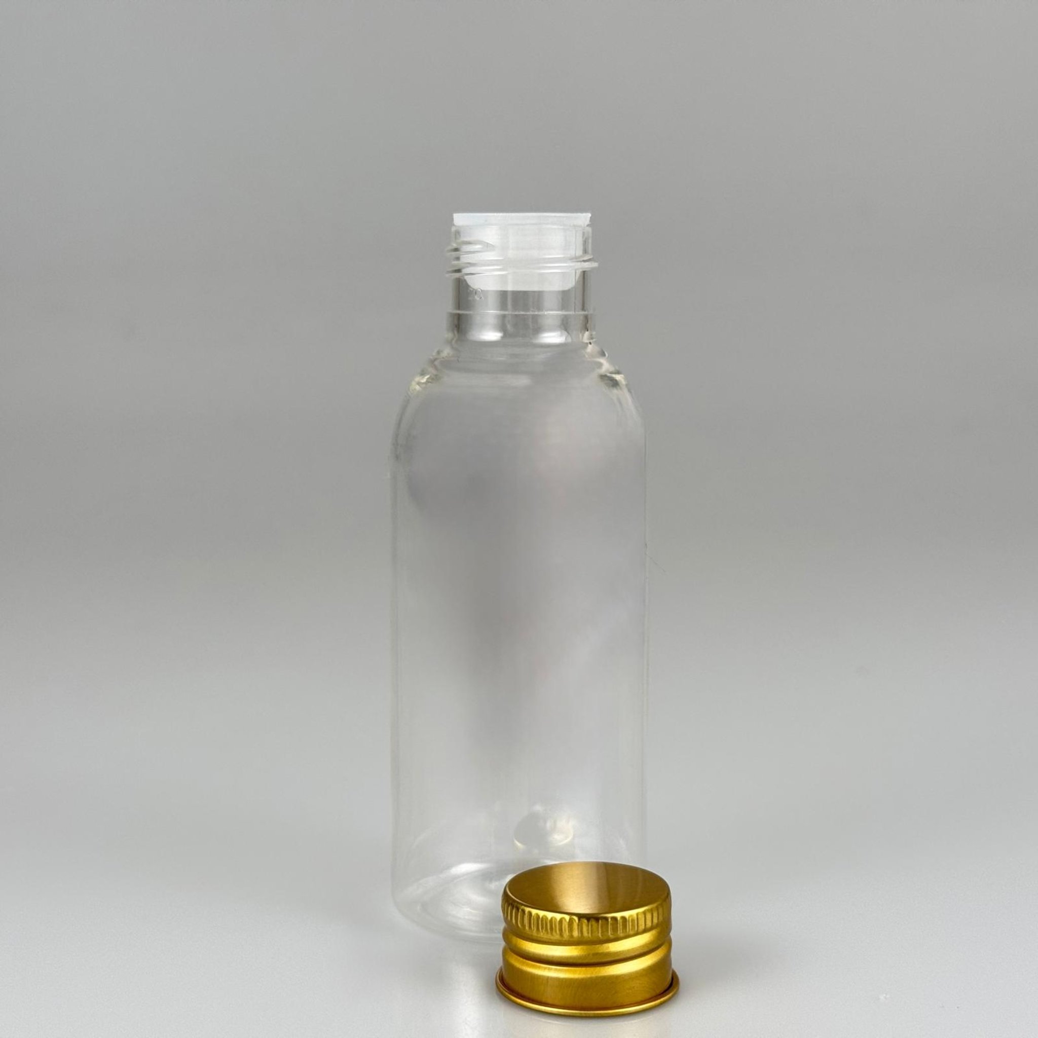 100 CC SİLİNDİR OVAL MODEL ŞEFFAF SERT PET ŞİŞE (24 AĞIZ) + KÖPÜK CONTALI GOLD METAL ALÜMİNYUM KAPAK + KOLONYA TIPALI TAKIM - 100 ML KAPAKLI KALIN PLASTİK ŞEFFAF ŞİŞELER
