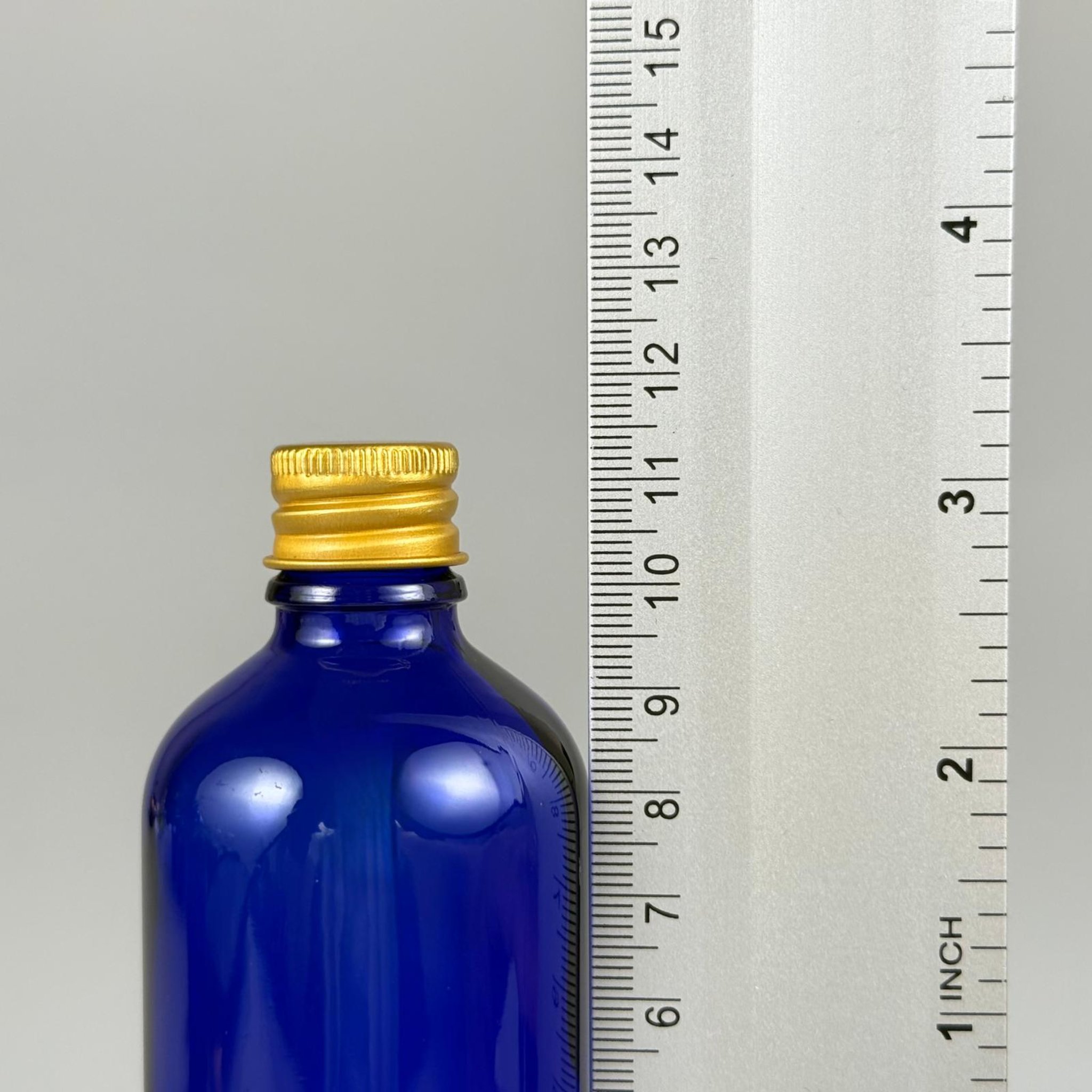 100 CC MAVİ CAM ŞİŞE + KÖPÜK CONTALI GOLD ALÜMİNYUM METAL + KÖR TIPALI KAPAKLI TAKIM - 100 ML MAVİ CAM ŞİŞE