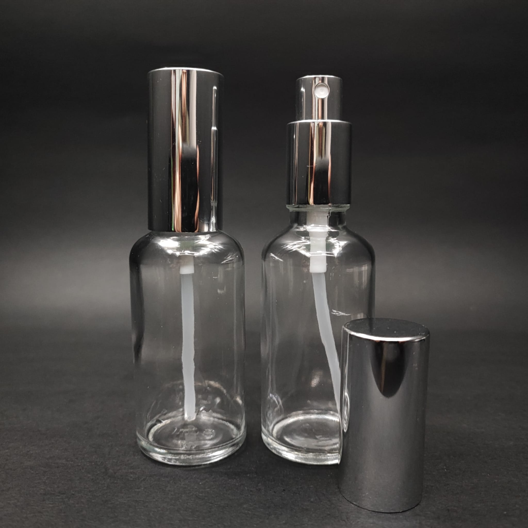 50 ML LÜKS VİDALI VALF ÇEVİRME PARFÜM ŞİŞELERİ - 50 CC ŞEFFAF CAM ŞİŞE - GÜMÜŞ METAL SPREYLİ KAPAKLI SET