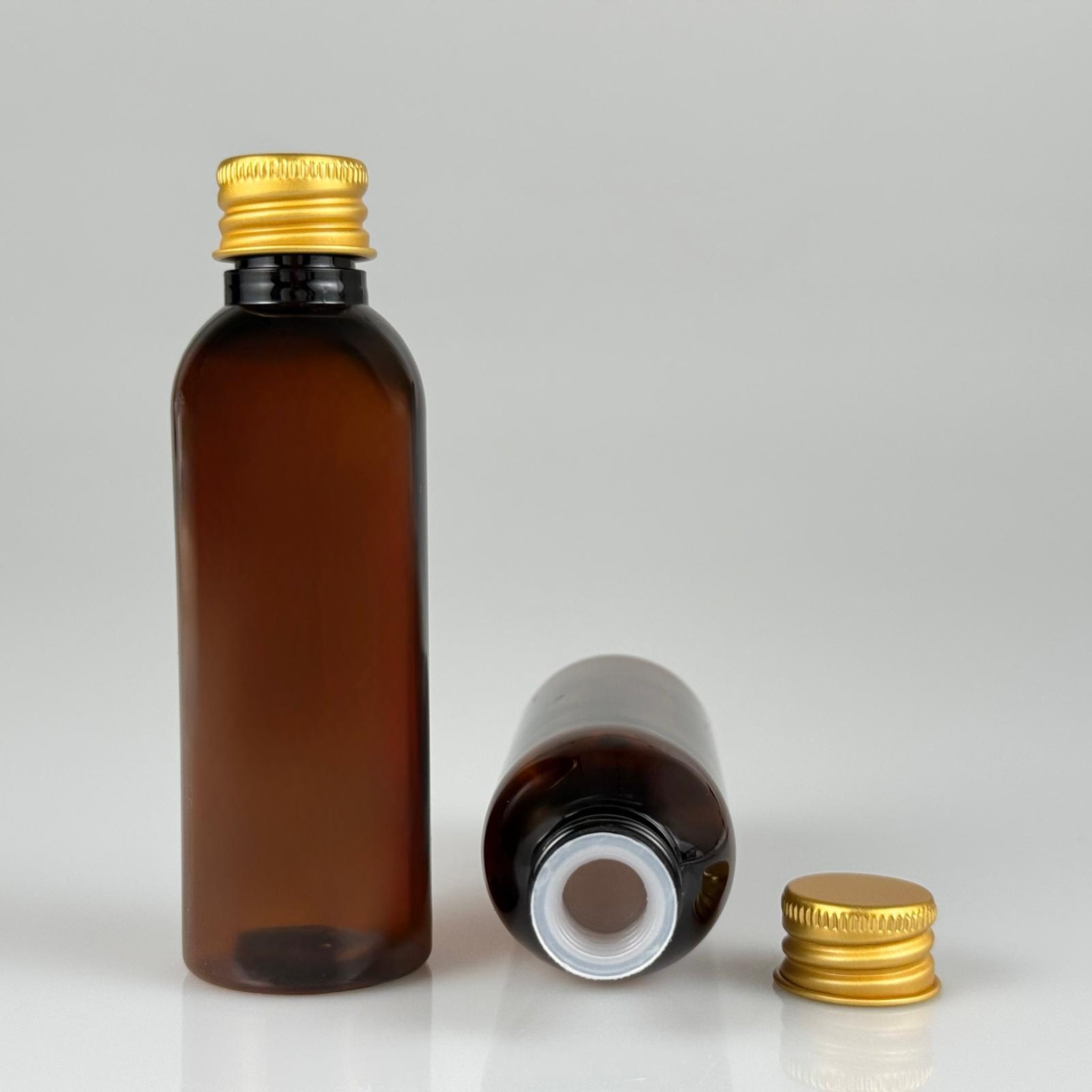 50 CC AMBER SİLİNDİR UZUN MODEL PET ŞİŞE + KÖPÜK CONTALI GOLD ALÜMİNYUM METAL KAPAKLI + KÖR TIPALI TAKIM - 50 ML KAHVERENGİ PLASTİK ŞİŞE
