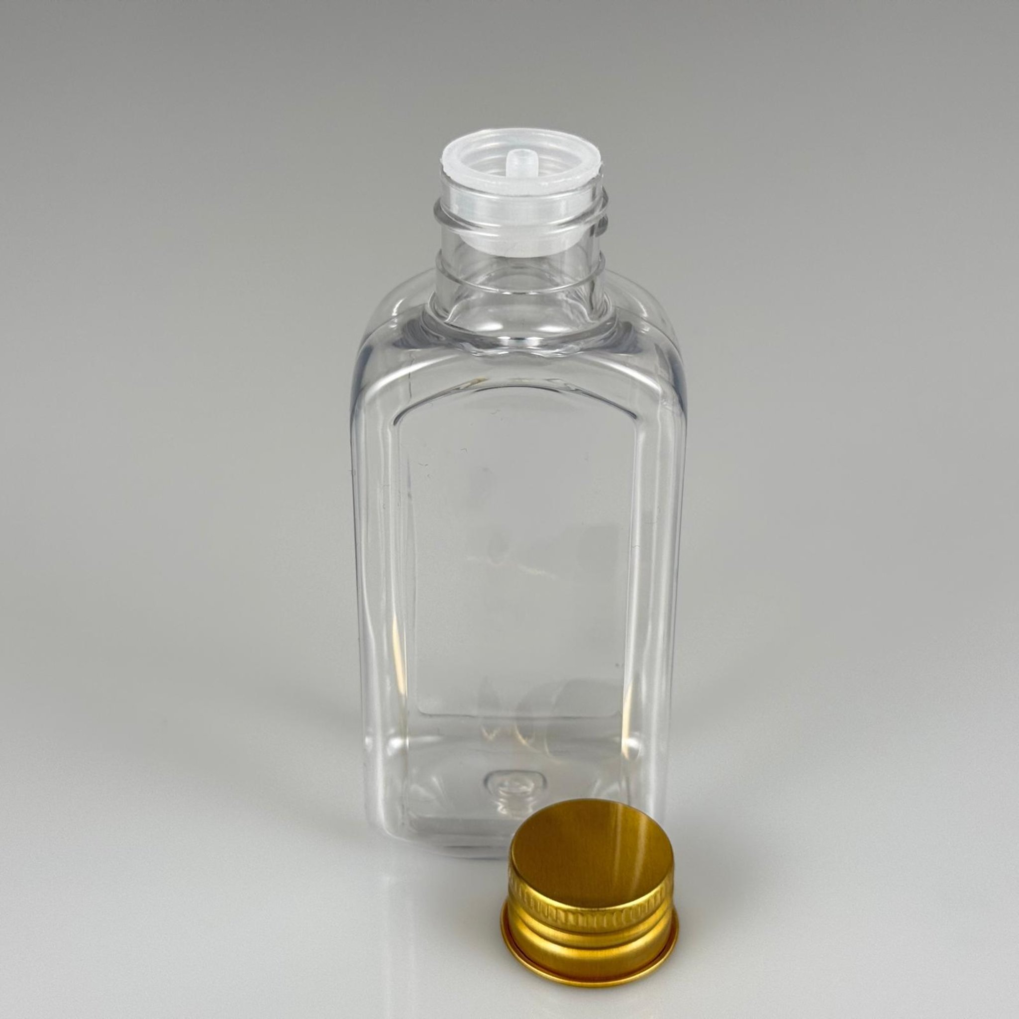 100 CC YASSI KÖŞELİ MODEL ŞEFFAF PET ŞİŞE (24 AĞIZ) + KÖPÜK CONTALI GOLD METAL ALÜMİNYUM KAPAK + KOLONYA TIPALI TAKIM - 100 ML KAPAKLI PLASTİK ŞİŞELER