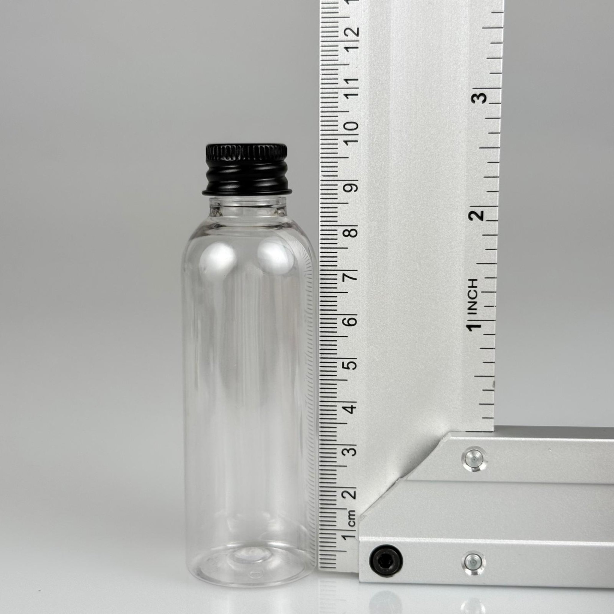 50 CC ŞEFFAF SİLİNDİR UZUN MODEL PET ŞİŞE + KÖPÜK CONTALI SİYAH ALÜMİNYUM METAL KAPAKLI TAKIM - 50 ML PLASTİK ŞİŞE