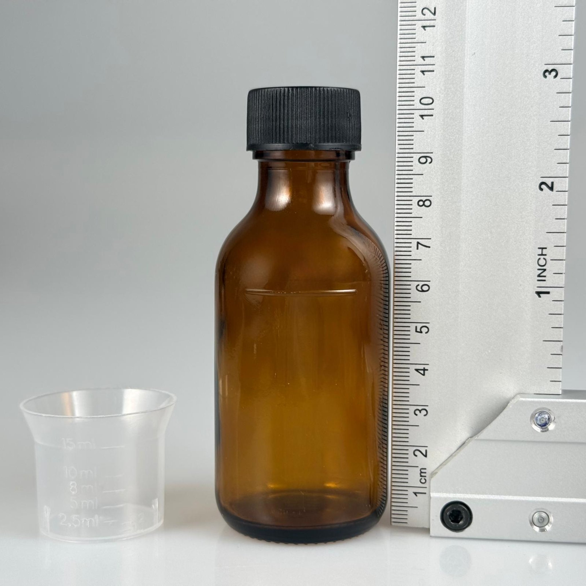 75 CC AMBER ECZA ŞİŞESİ + SİYAH KAPAK + 15 ML ÖLÇEK TAKIM - 75 AĞIZ KAHVERENGİ ŞURUP ŞİŞESİ