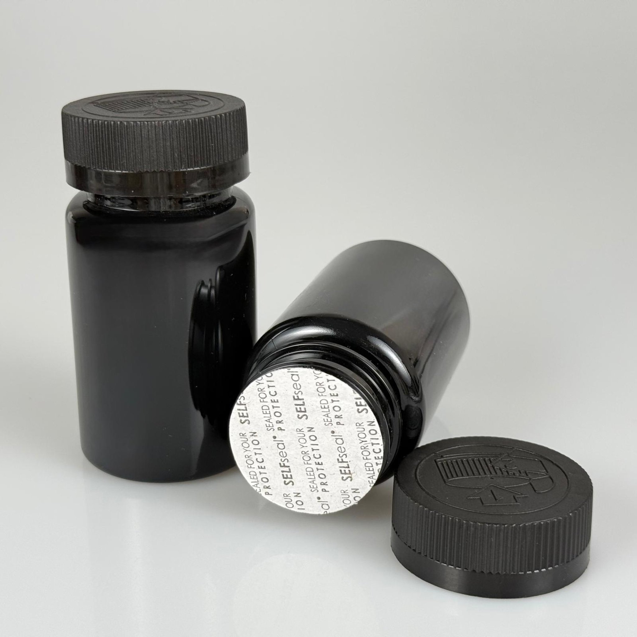 100 ML CONTALI ÇOCUK KİLİT KAPAKLI TABLET ŞİŞESİ  - 100 CC SİYAH PET KAVANOZ + 38 MM SİYAH ÇOCUK KİLİTLİ KAPAK + KENDİNDEN YAPIŞKANLI KÖPÜK CONTA TAKIM -  KAPSÜL KUTUSU - İLAÇ ŞİŞESİ - MEDİKAL HAP ŞİŞESİ - FARMASÖTİK KAVANOZ