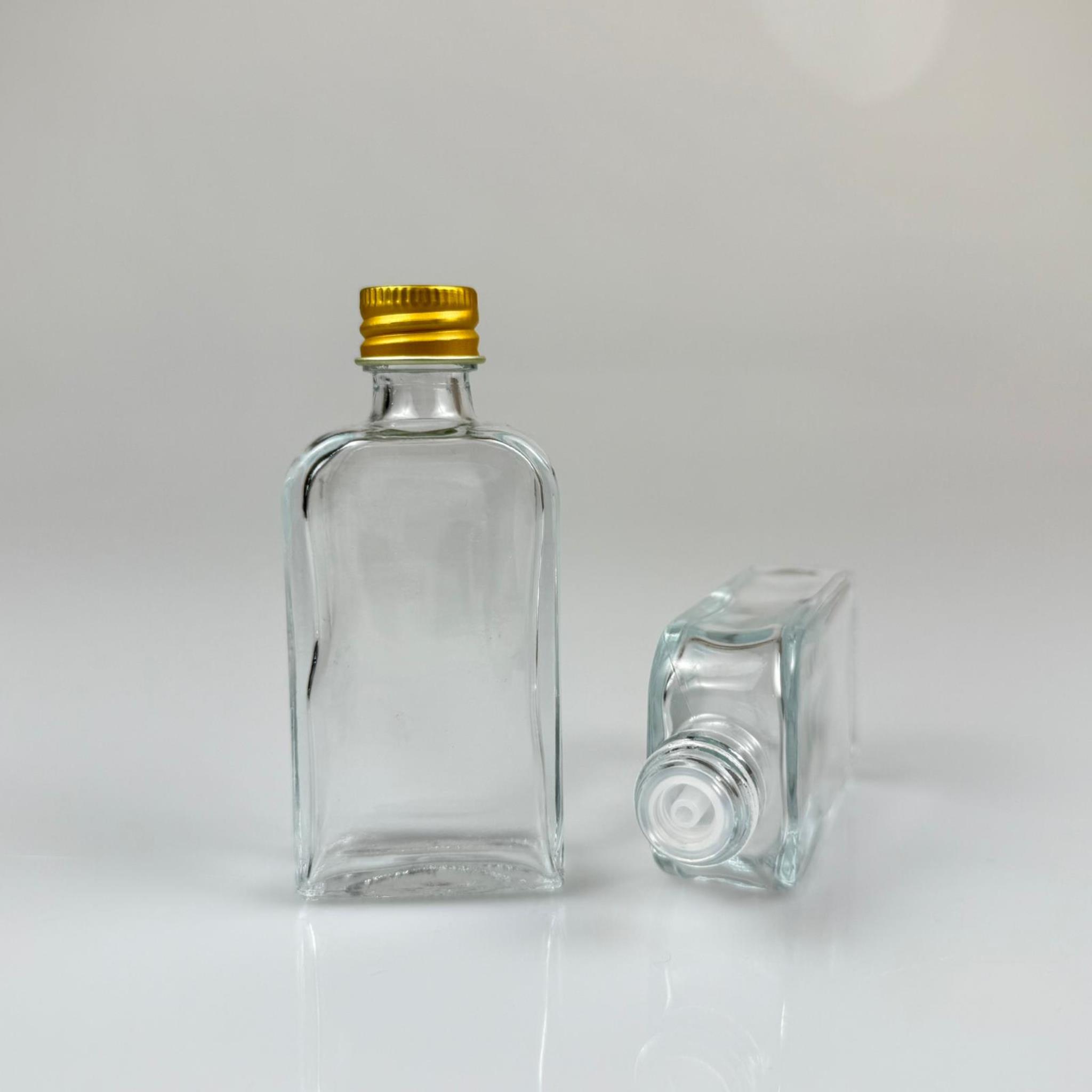 50 CC YASSI DİKDÖRTGEN CAM ŞİŞE - GOLD METAL KAPAKLI KOLONYA TIPALI - 50 ML PRESTİJLİ ŞİŞE