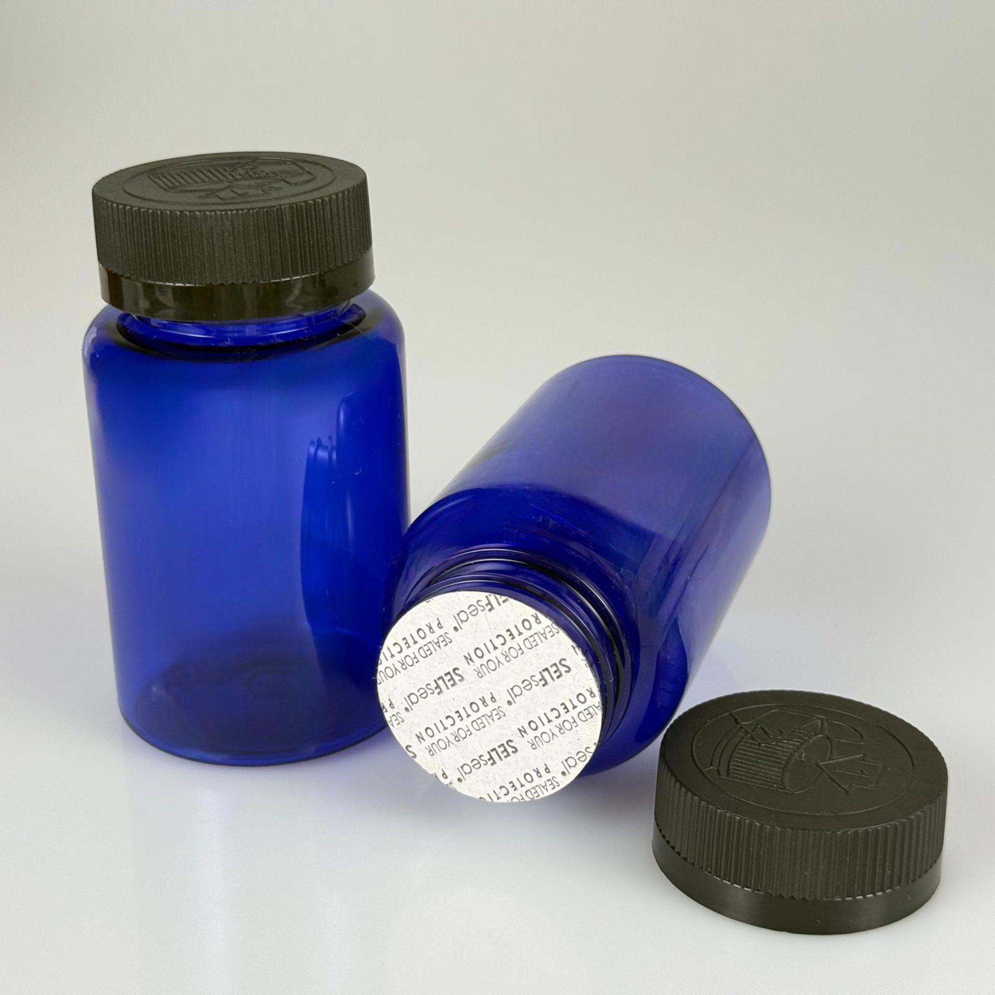150 ML CONTALI ÇOCUK KİLİT KAPAKLI TABLET ŞİŞESİ  - 150 CC MAVİ PET KAVANOZ + 38 MM SİYAH ÇOCUK KİLİTLİ KAPAK + KENDİNDEN YAPIŞKANLI KÖPÜK CONTA TAKIM -  KAPSÜL KUTUSU - İLAÇ ŞİŞESİ - MEDİKAL HAP ŞİŞESİ - FARMASÖTİK KAVANOZ