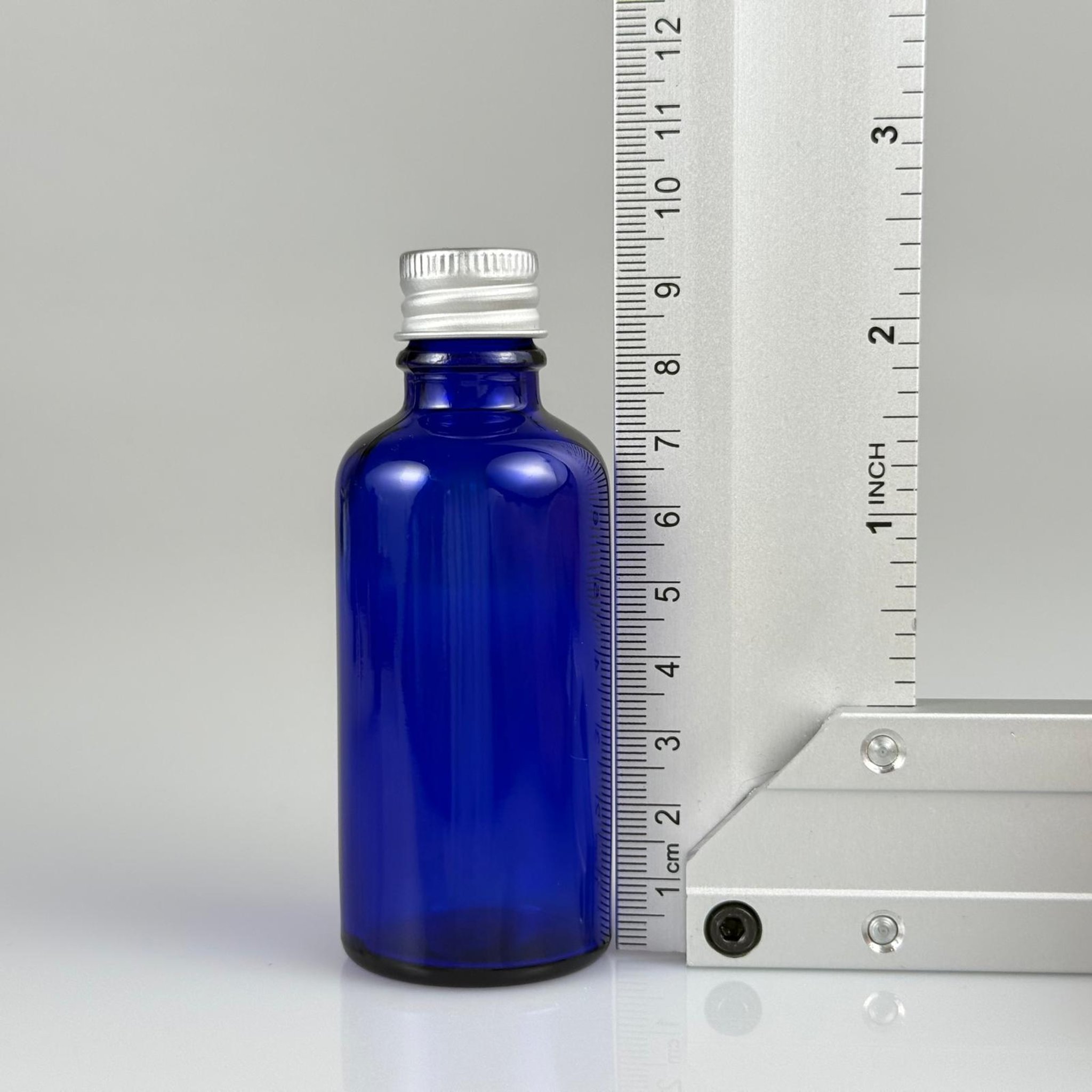 50 CC MAVİ CAM ŞİŞE + KÖPÜK CONTALI GÜMÜŞ ALÜMİNYUM METAL KAPAKLI + KÖR TIPALI TAKIM - 50 ML MAVİ CAM ŞİŞE